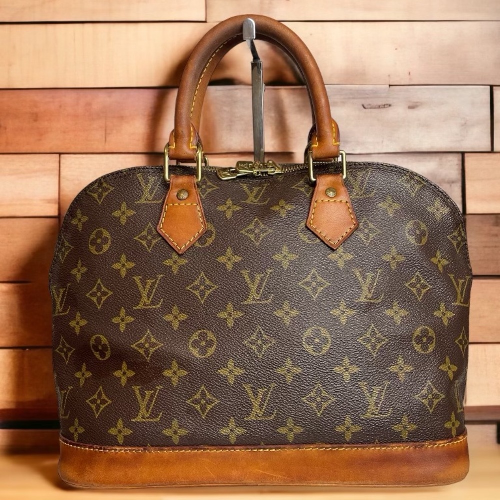 LOUIS VUITTON MONOGRAM ALMA PM 

Authentic Louis Vuitton Monogram Alma Handbag